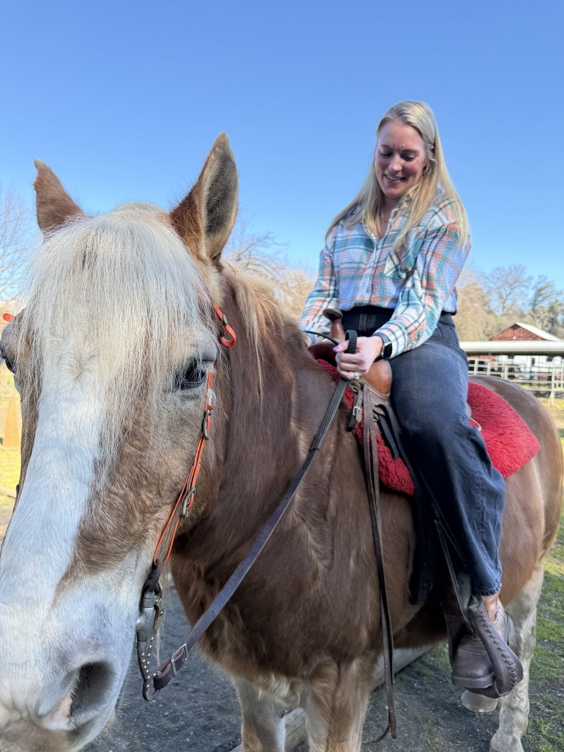 Lauren Eriksen on horseback at her Northern California homestead